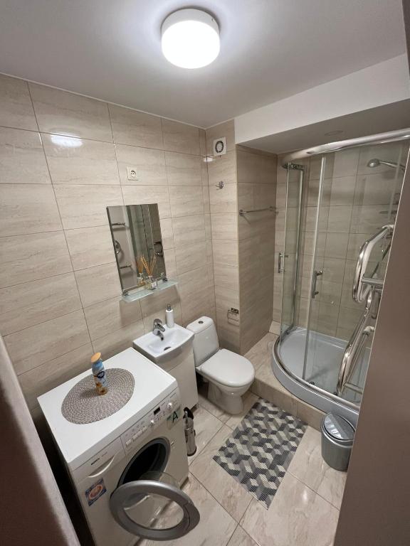 Koupelna v ubytování Apartamentai Jonavoje #1