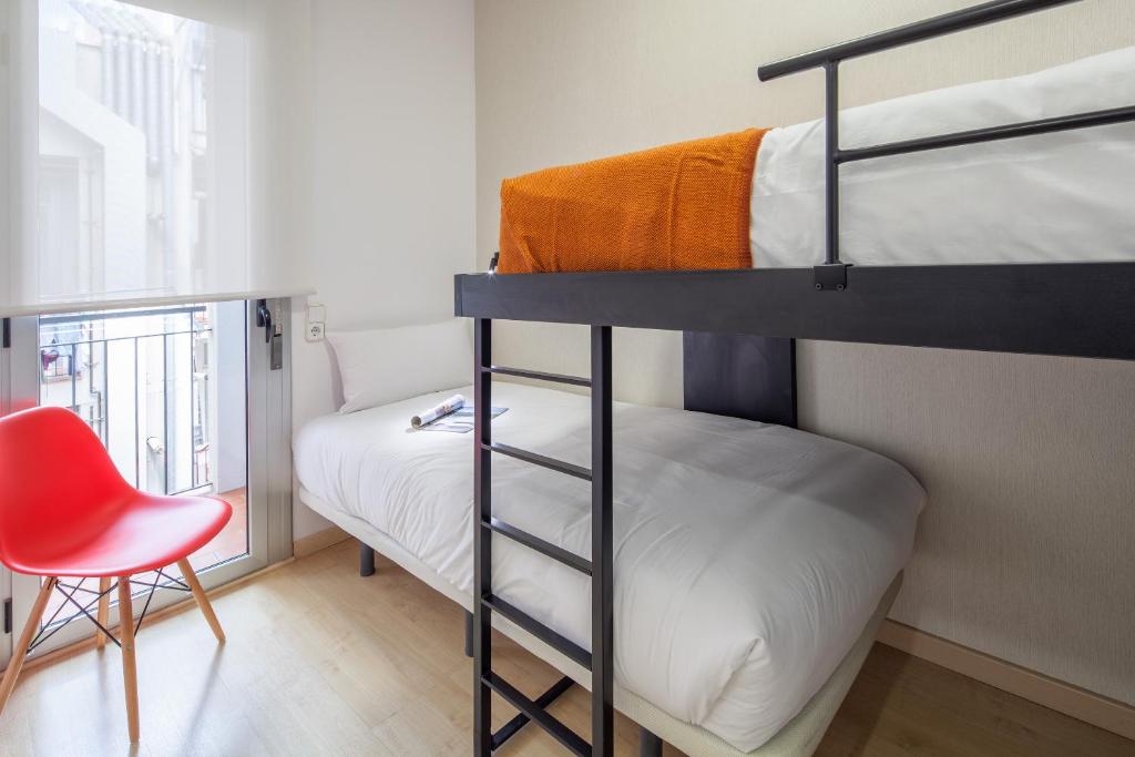 A bed or beds in a room at Habitat Apartments Hot Jazz
