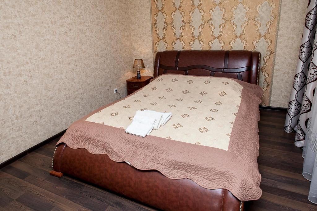 Postel nebo postele na pokoji v ubytování Chyhorinskyi Hotel