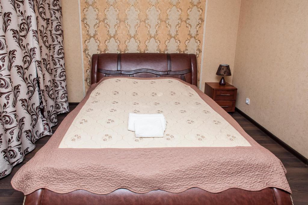 Postel nebo postele na pokoji v ubytování Chyhorinskyi Hotel