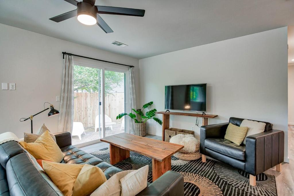 a living room with a couch and a table at Starlight Retreat in Redding