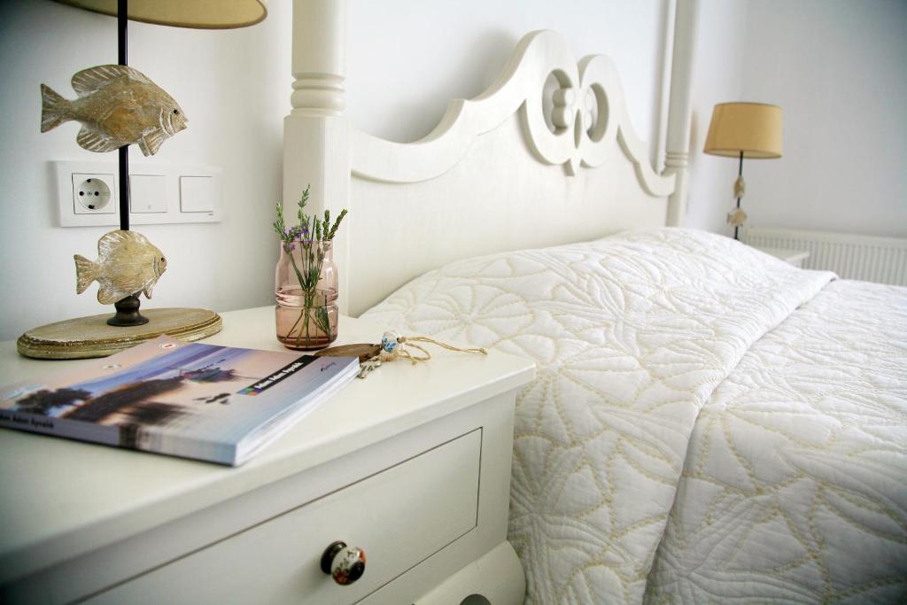 A bed or beds in a room at Gule Cunda