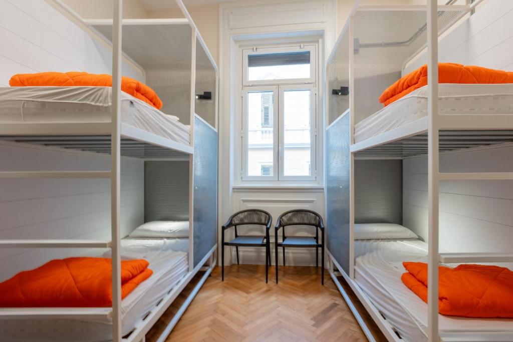 Postel nebo postele na pokoji v ubytování Casali Hostel