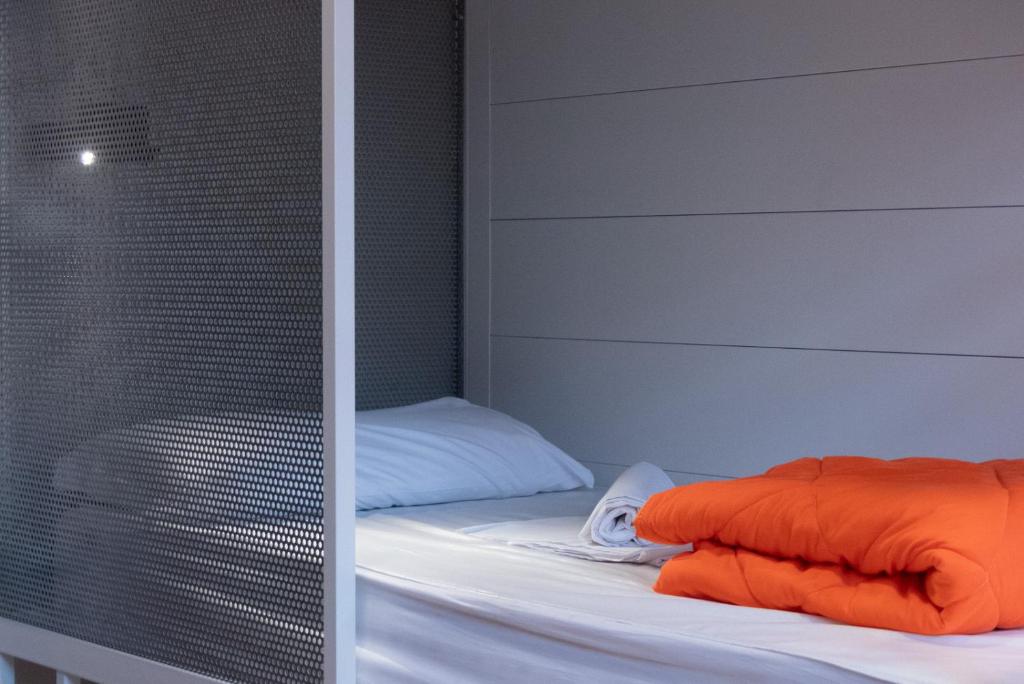 Postel nebo postele na pokoji v ubytování Casali Hostel