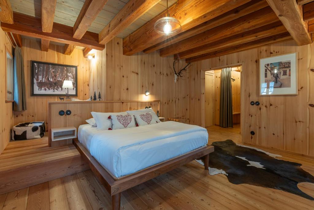 Postel nebo postele na pokoji v ubytování Hammerack Hotel