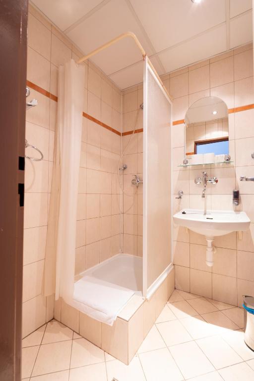Koupelna v ubytování Hotel Slovakia