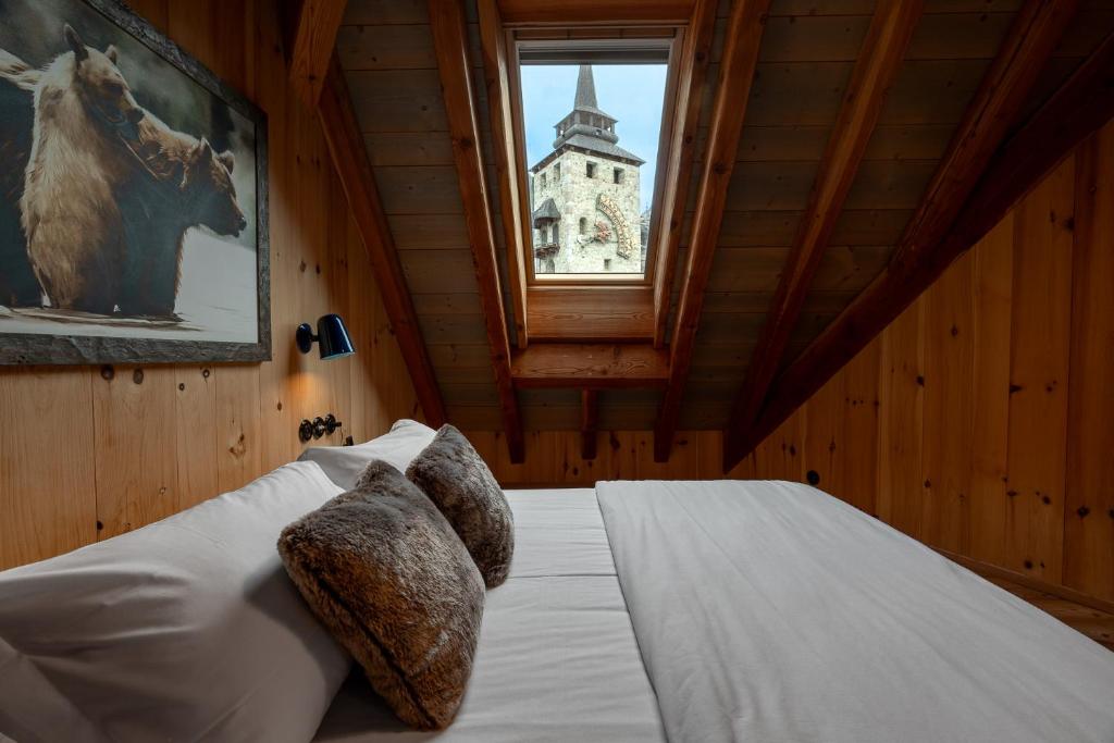 Postel nebo postele na pokoji v ubytování Hammerack Hotel