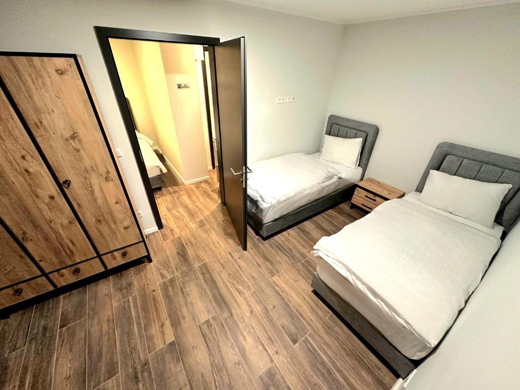 Postel nebo postele na pokoji v ubytování Hotel FFA 62
