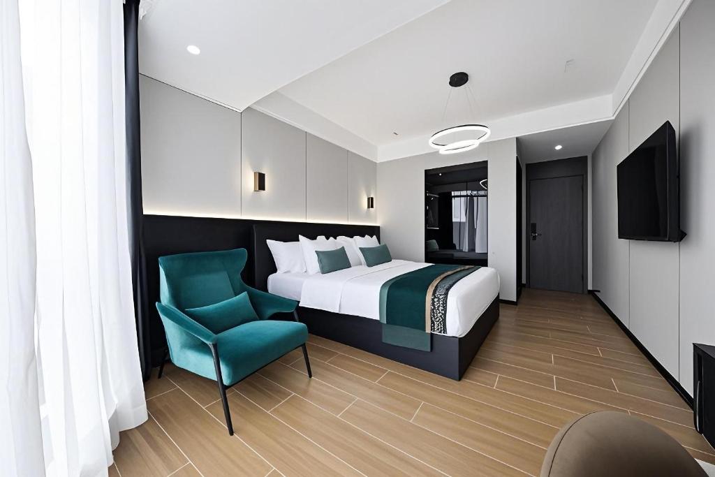 Postel nebo postele na pokoji v ubytování 颐程City View Hotel-广州太古汇珠江新城体育中心石牌桥地铁站店-广交会专享