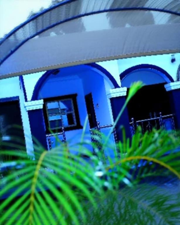Blue Exterior Detail - Luke's Luxurious Homes Benin City