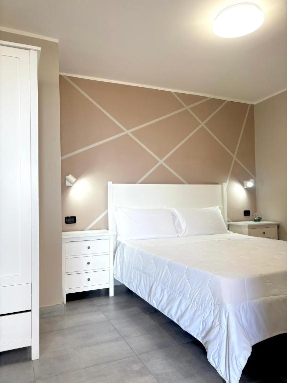 Postel nebo postele na pokoji v ubytování ALDIVA ROOMS