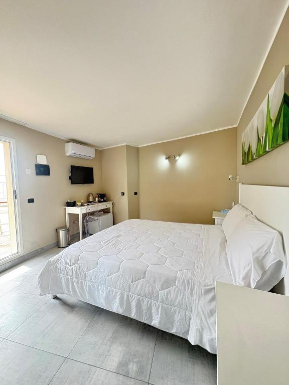 Postel nebo postele na pokoji v ubytování ALDIVA ROOMS
