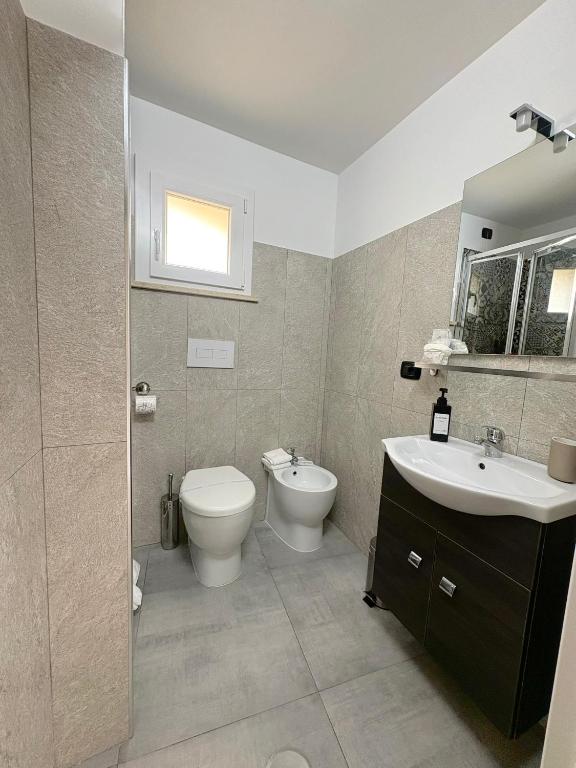 Koupelna v ubytování ALDIVA ROOMS