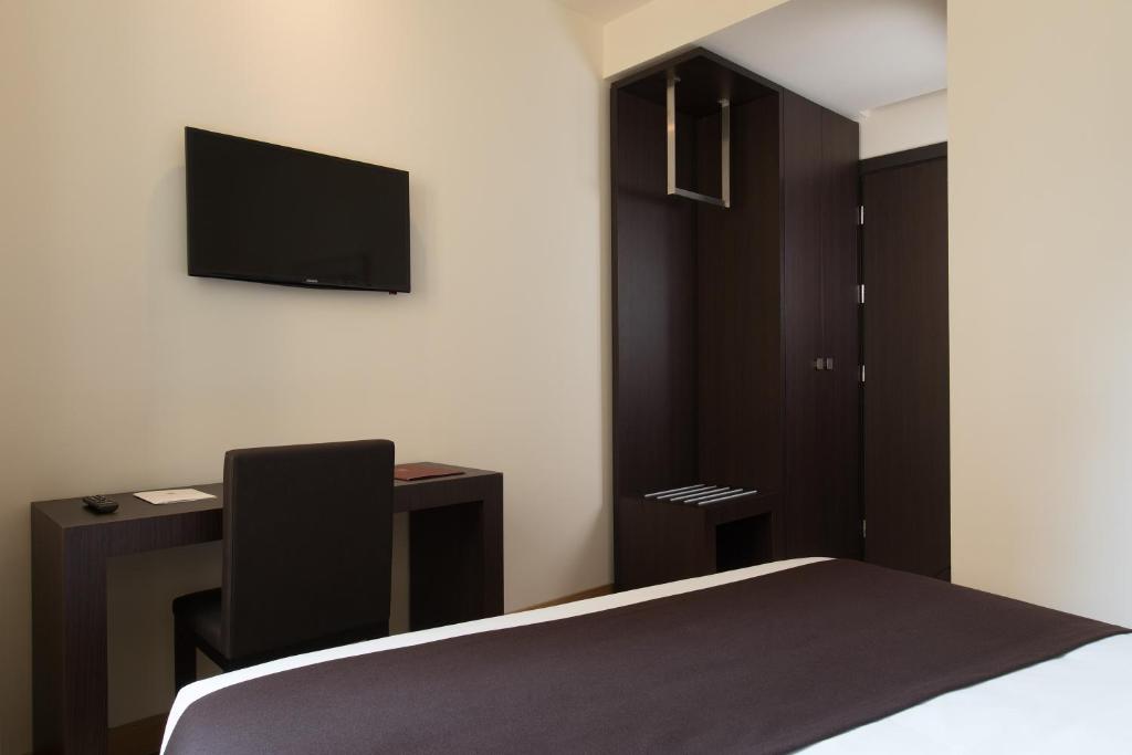 TV a/nebo společenská místnost v ubytování Hotel Tiferno