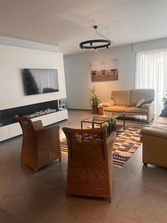 Posezení v ubytování vakantiewoning Baaltje