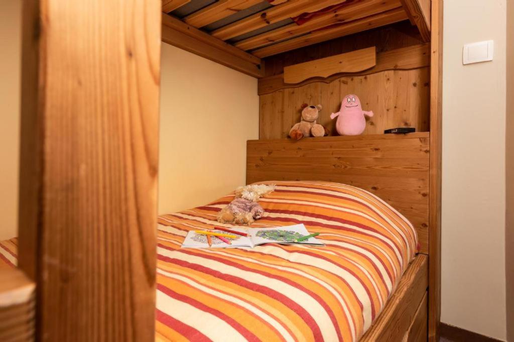 Postel nebo postele na pokoji v ubytování Résidence Le Chamois d'Or