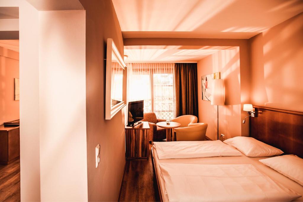Postel nebo postele na pokoji v ubytování Simon - das Vitalhotel