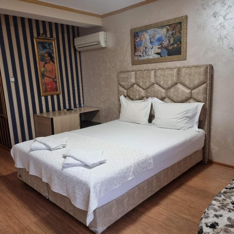Postel nebo postele na pokoji v ubytování Hotel Gabi