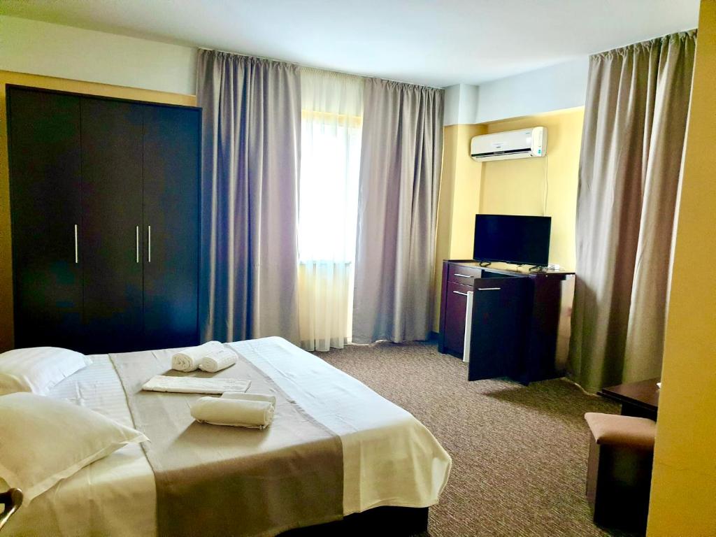 Postel nebo postele na pokoji v ubytování Casa Mario