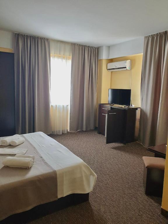 Postel nebo postele na pokoji v ubytování Casa Mario