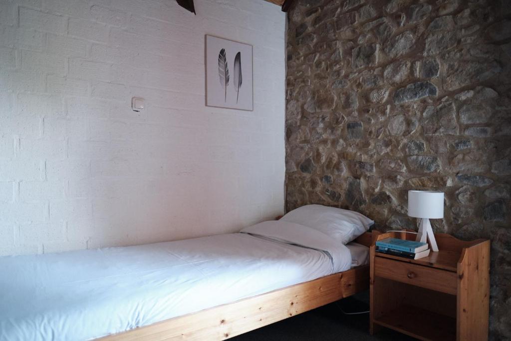 Postel nebo postele na pokoji v ubytování Camping Cottesserhoeve
