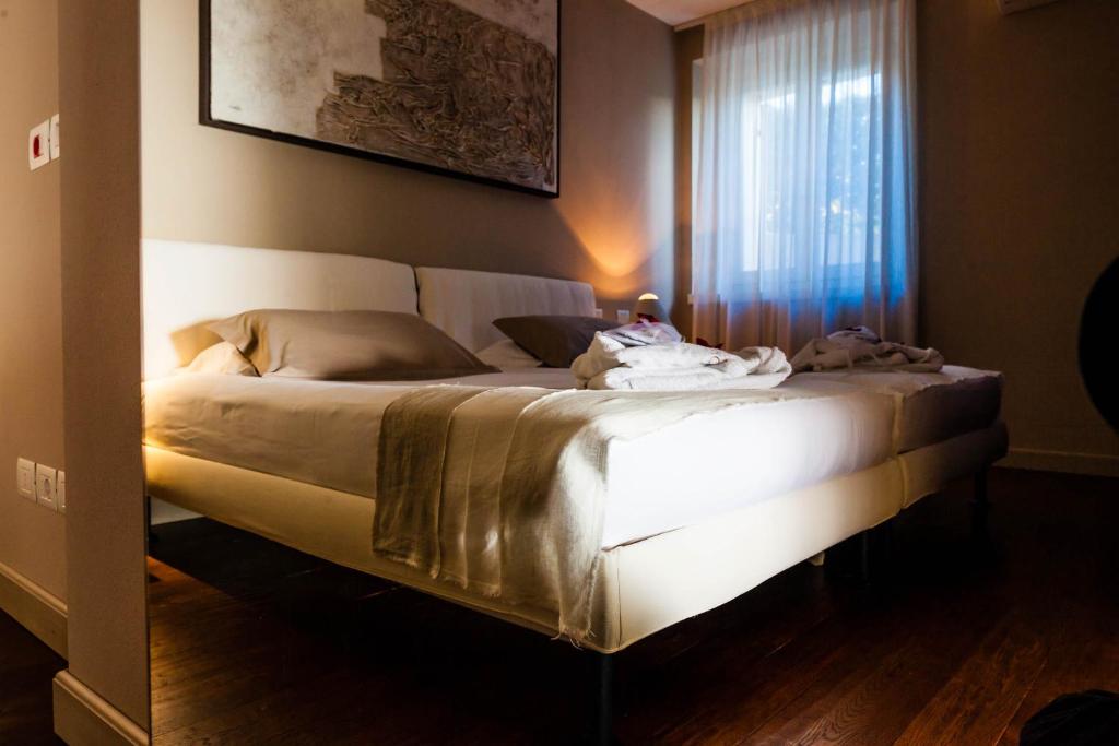 Postel nebo postele na pokoji v ubytování Quercia Belvedere Relais