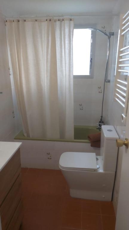 A bathroom at MIAMI PLAYA SIRENS en Cala Sirenas FREE WIFI