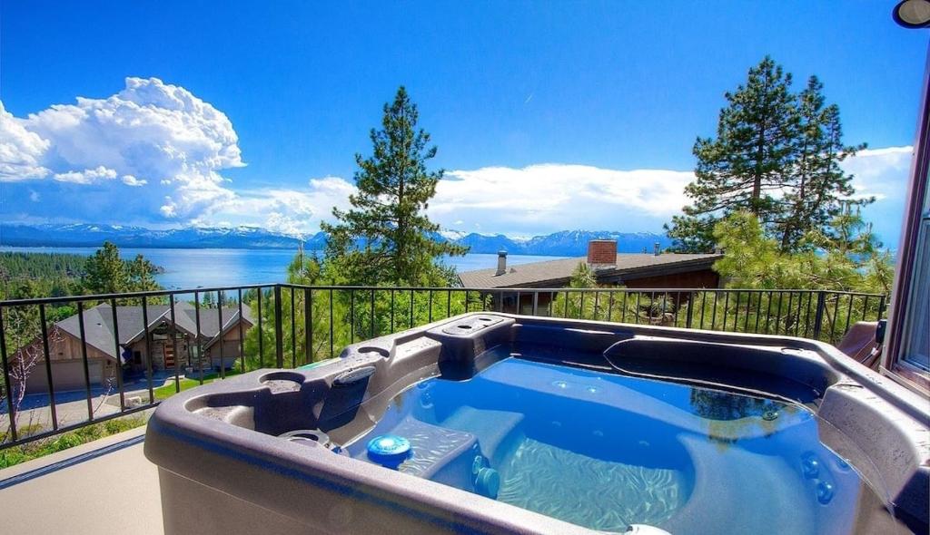 a hot tub on the balcony of a house at The Heights home in Zephyr Cove