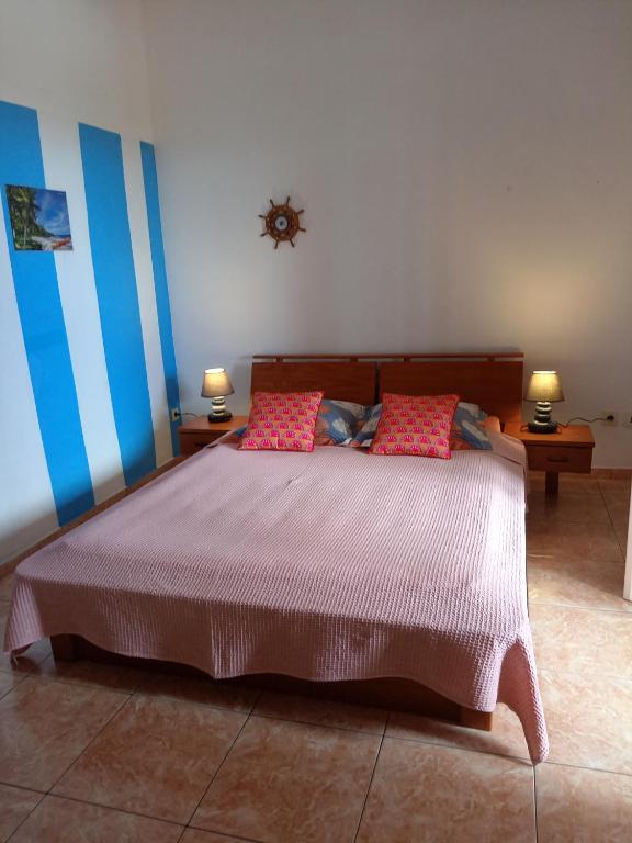 Postel nebo postele na pokoji v ubytování Appartement Le Papangue