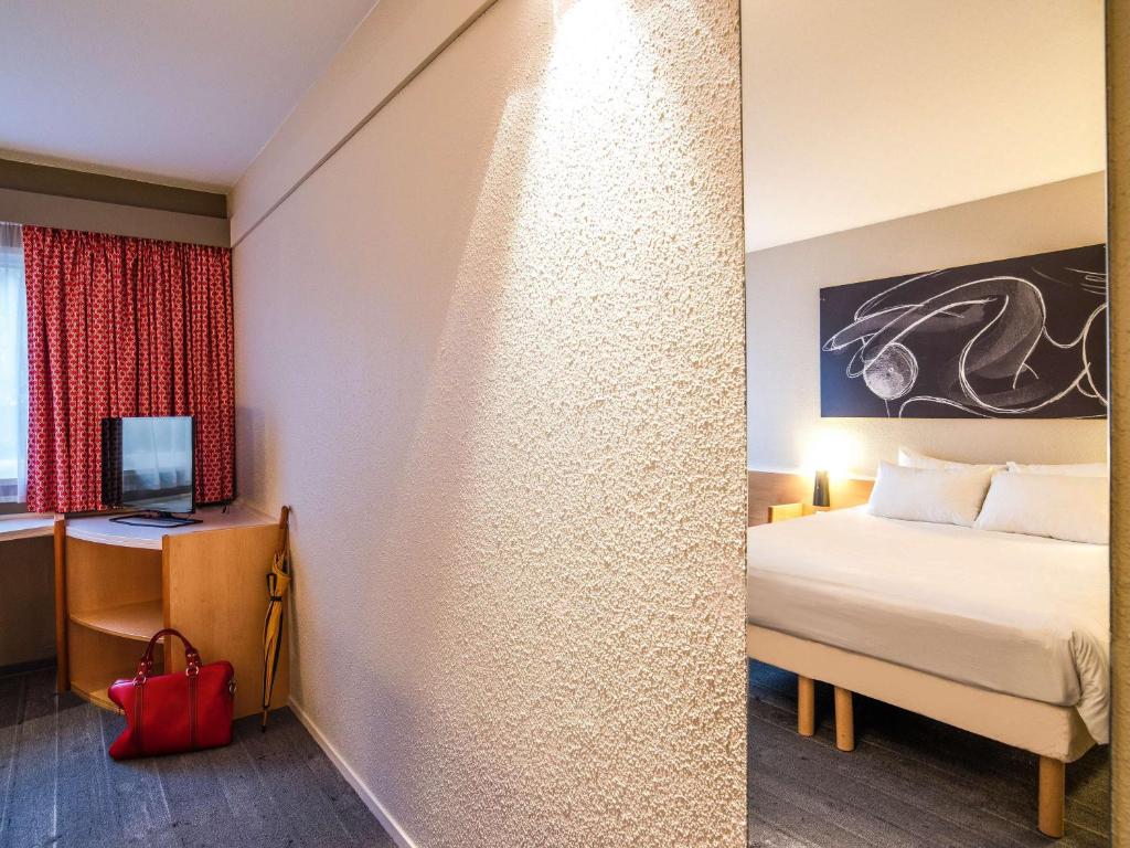 Postel nebo postele na pokoji v ubytování ibis Metz Nord