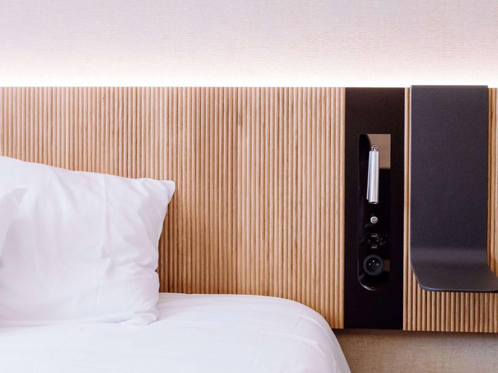 Postel nebo postele na pokoji v ubytování Novotel Montpellier