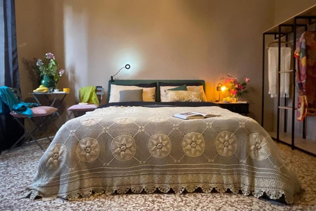 Postel nebo postele na pokoji v ubytování la Breda