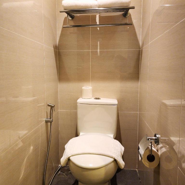 Uma casa de banho em Savoy Hotel Mactan