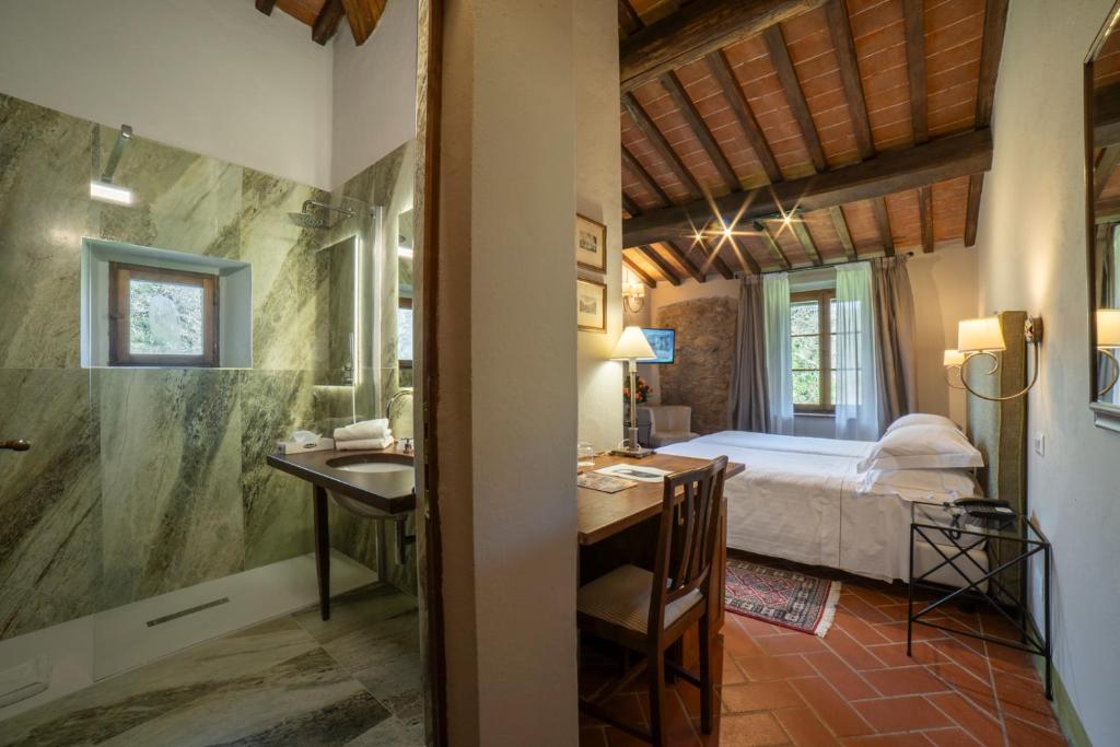 Postel nebo postele na pokoji v ubytování Ultimo Mulino Country Hotel