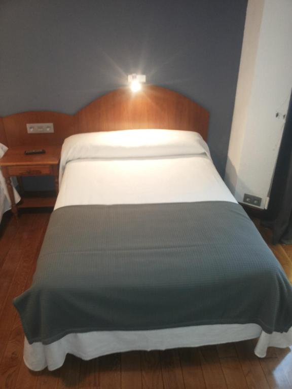 Postel nebo postele na pokoji v ubytování Hotel Urgaín
