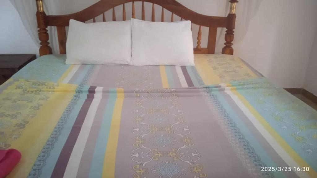 Postel nebo postele na pokoji v ubytování Aloe Vera Garden