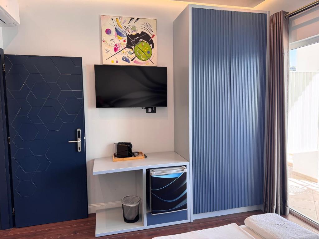 TV a/nebo společenská místnost v ubytování Airstay seaview Saranda