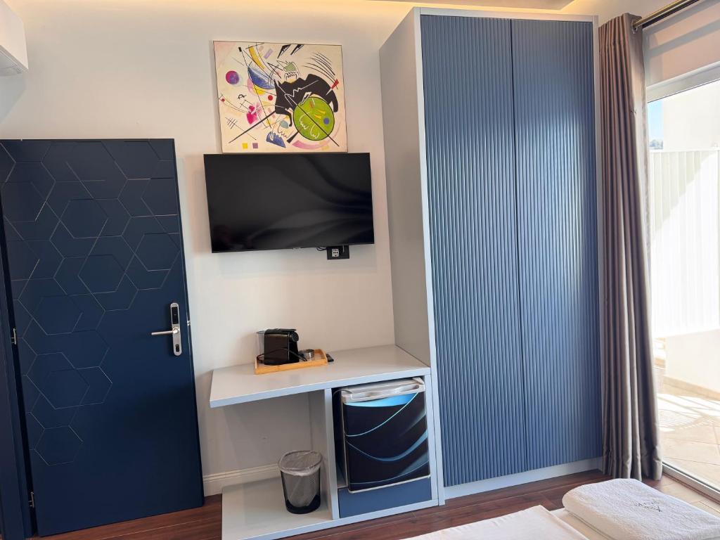 TV a/nebo společenská místnost v ubytování Airstay seaview Saranda