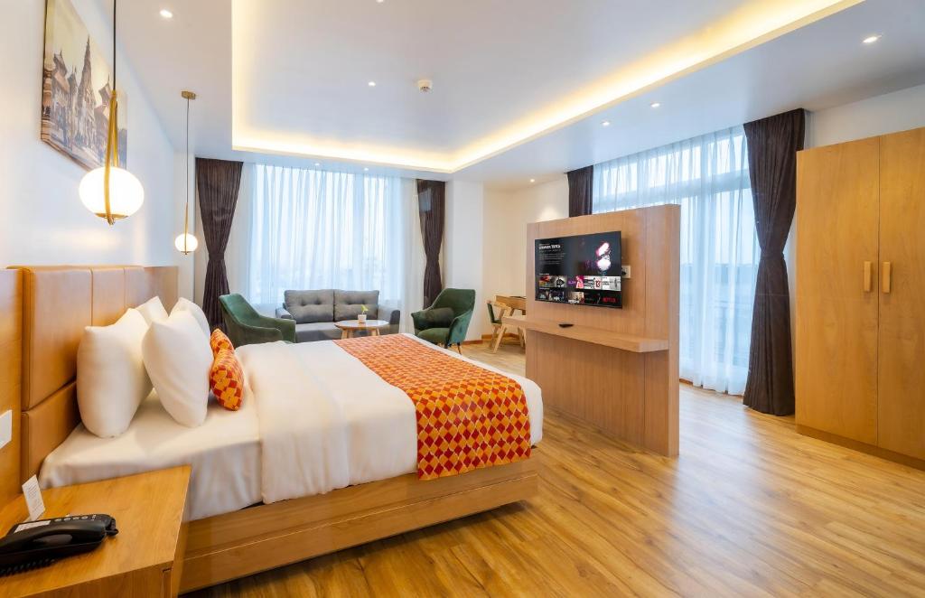 Voodi või voodid majutusasutuse Hotel Anuttara toas