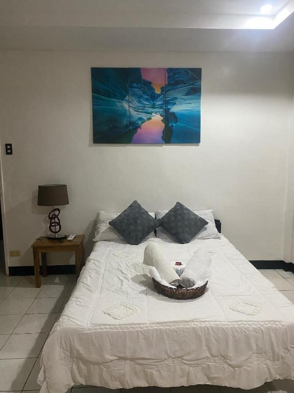 Postel nebo postele na pokoji v ubytování Antonio Homestay