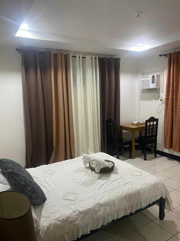 Postel nebo postele na pokoji v ubytování Antonio Homestay