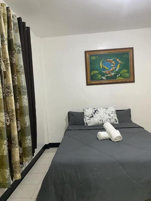 Postel nebo postele na pokoji v ubytování Antonio Homestay