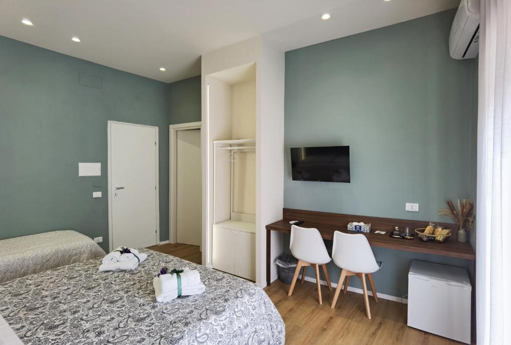 Postel nebo postele na pokoji v ubytování Tersikore bedrooms