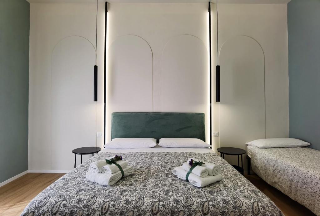 Postel nebo postele na pokoji v ubytování Tersikore bedrooms