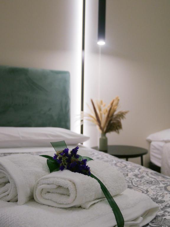 Postel nebo postele na pokoji v ubytování Tersikore bedrooms