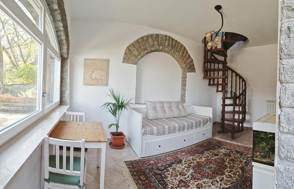 Postel nebo postele na pokoji v ubytování B&B Il Fiore nel Bosco