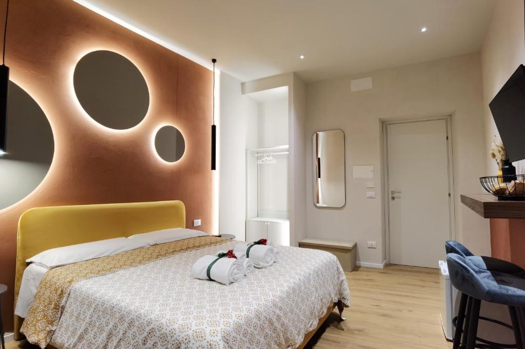 Postel nebo postele na pokoji v ubytování Tersikore bedrooms