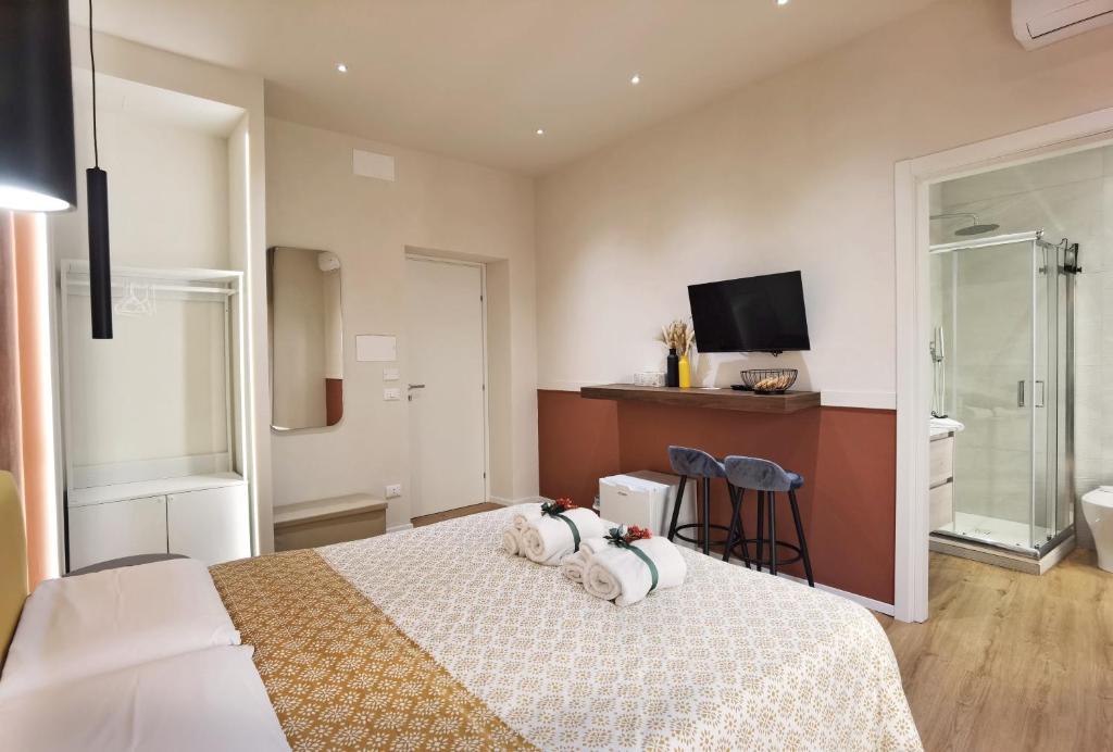 Postel nebo postele na pokoji v ubytování Tersikore bedrooms