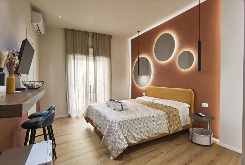 Postel nebo postele na pokoji v ubytování Tersikore bedrooms