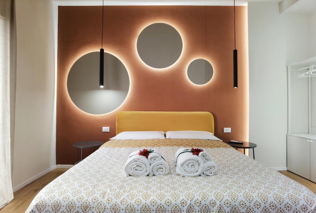 Postel nebo postele na pokoji v ubytování Tersikore bedrooms